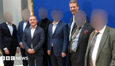 Published on the website of a Ukrainian tv channel (112ua.tv) in February 2019 - the channel has been shut down by Zelensky after the Russian invasion. Third from left is Oleg Voloshyn, named in David Deans' copy and was the man in contact with Nathan Gill before his speeches in the European Parliament. Gill and Voloshyn both wear suits and stand among six other men in suits.