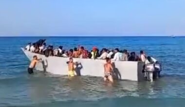 Moment raging tourists reject migrant boat and push it BACK into water | World | News