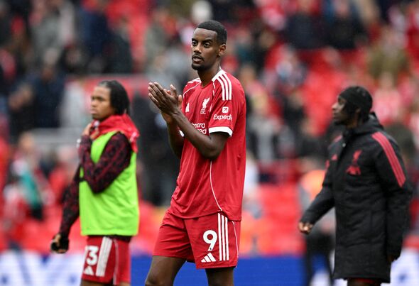 Alexander Isak clapping Liverpool fans.