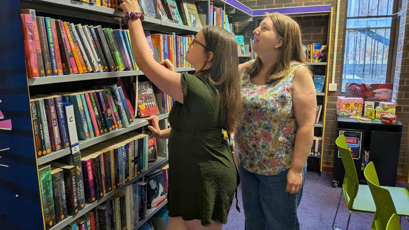 Young reader completes whistle-stop tour of county's libraries