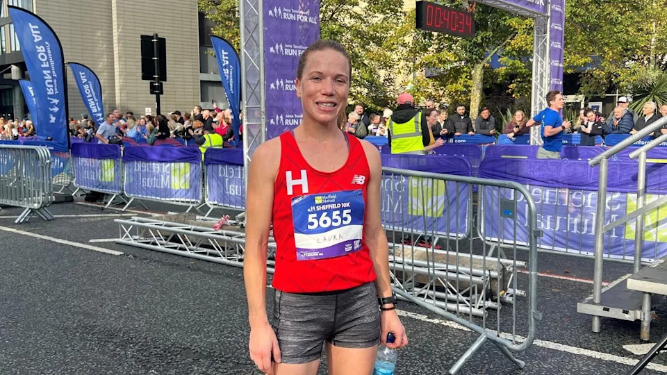 Laura Smith, 34, after finishing the Sheffield 10K wearing a red vest and black shorts