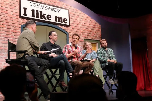 Getty Images From Left: George Stroumboulopoulos, Colin Hanks, Ryan Reynolds, Jennifer Candy and Christopher Candy in Toronto on Sept. 4, 2025