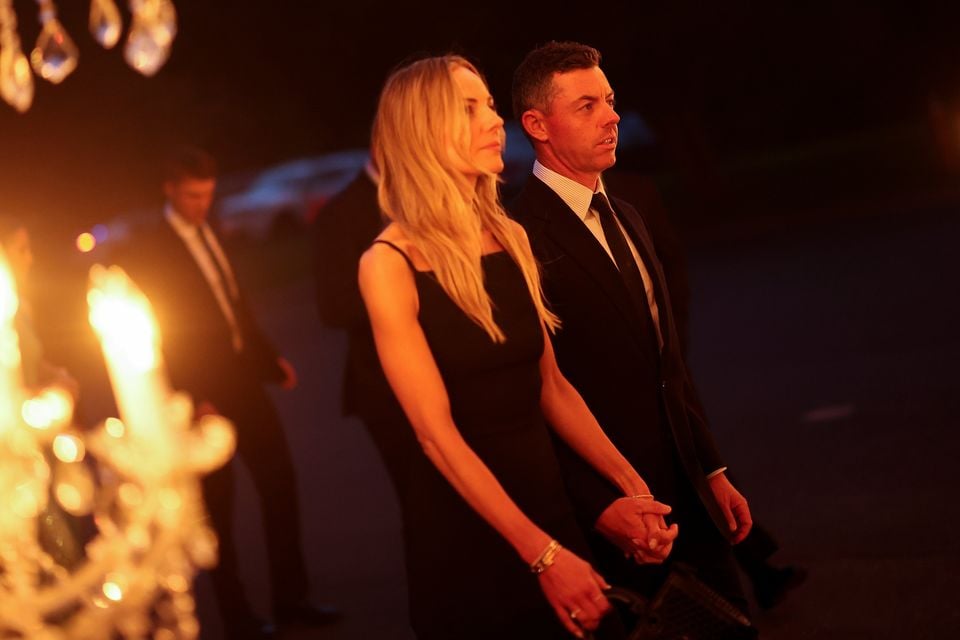 Rory McIlroy of Team Europe and wife Erica Stoll McIlroy arrive for the the Ryder Cup Teams' Welcome Dinner prior to the Ryder Cup 2025 at Hempstead House on September 23, 2025 in Sands Point, New York. (Photo by Carl Recine/Getty Images)