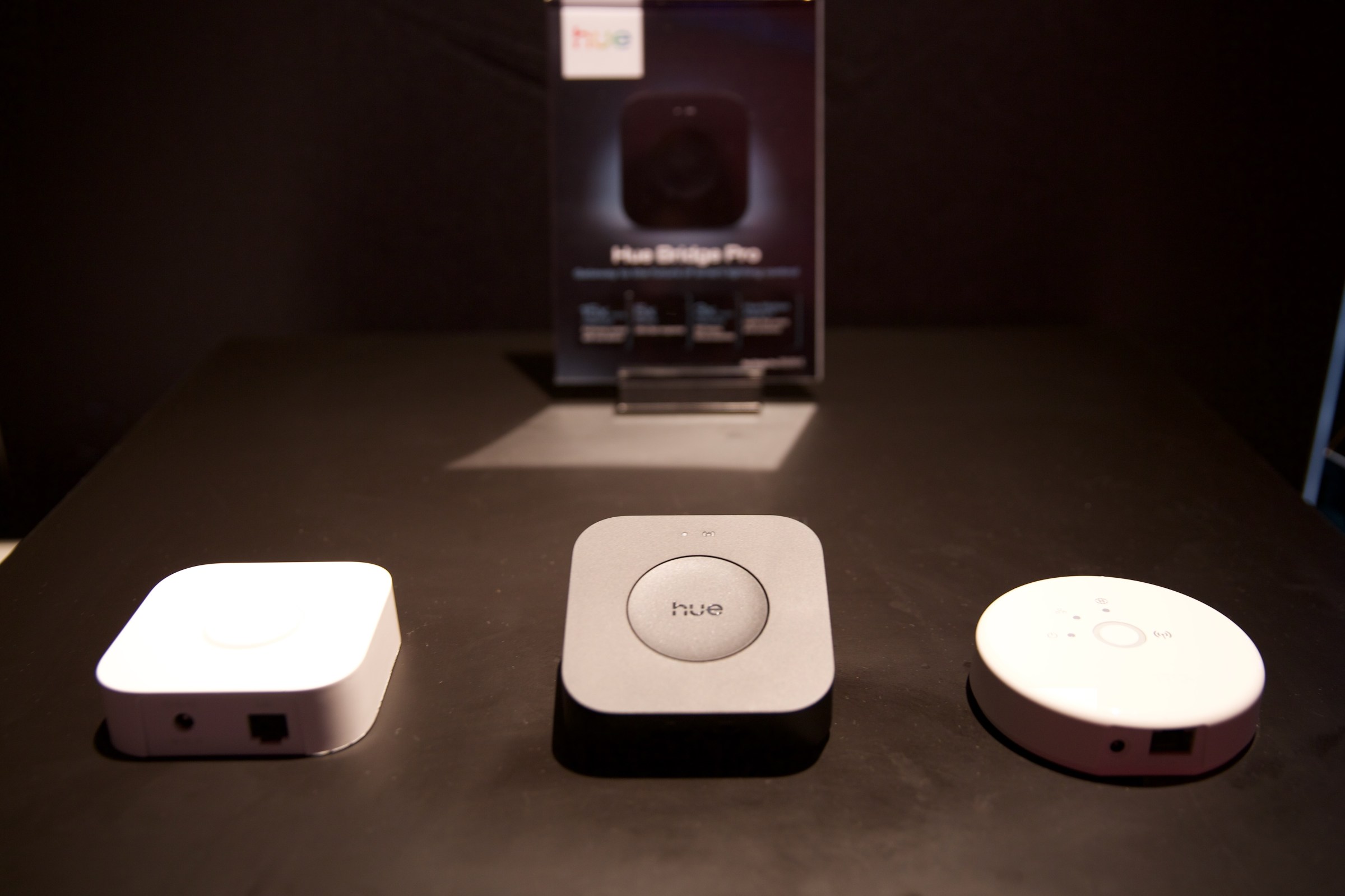 The new Hue Bridge Pro (center) is the third generation of the company’s Zigbee hub.