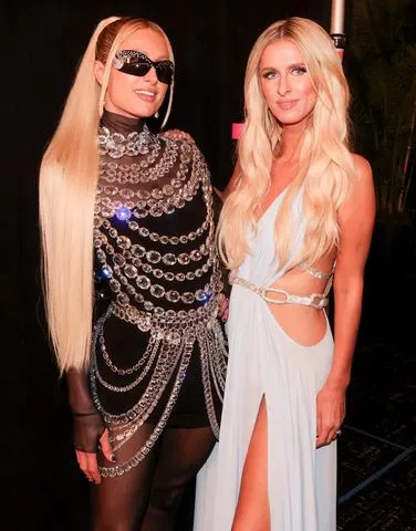 Christopher Polk/Billboard via Getty Paris Hilton and Nicky Hilton Rothschild