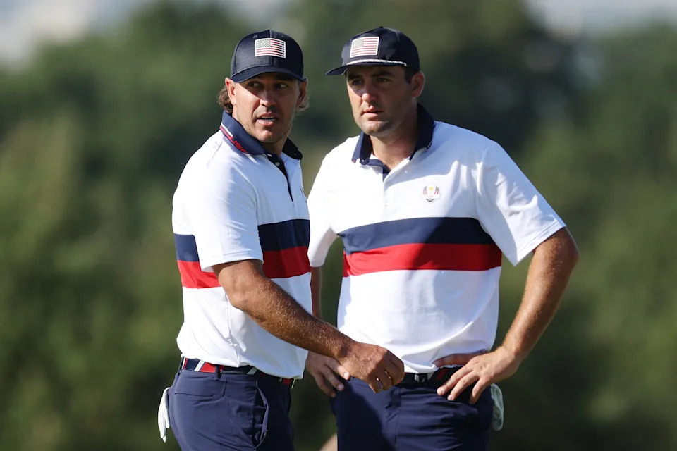 Brooks Koepka and Scottie Scheffler react upon losing their match to Viktor Hovland and Ludvig Aberg of Team Europe 9&7 during the Saturday morning foursomes matches of the 2023 Ryder Cup at Marco Simone Golf Club on September 30, 2023 in Rome, Italy.