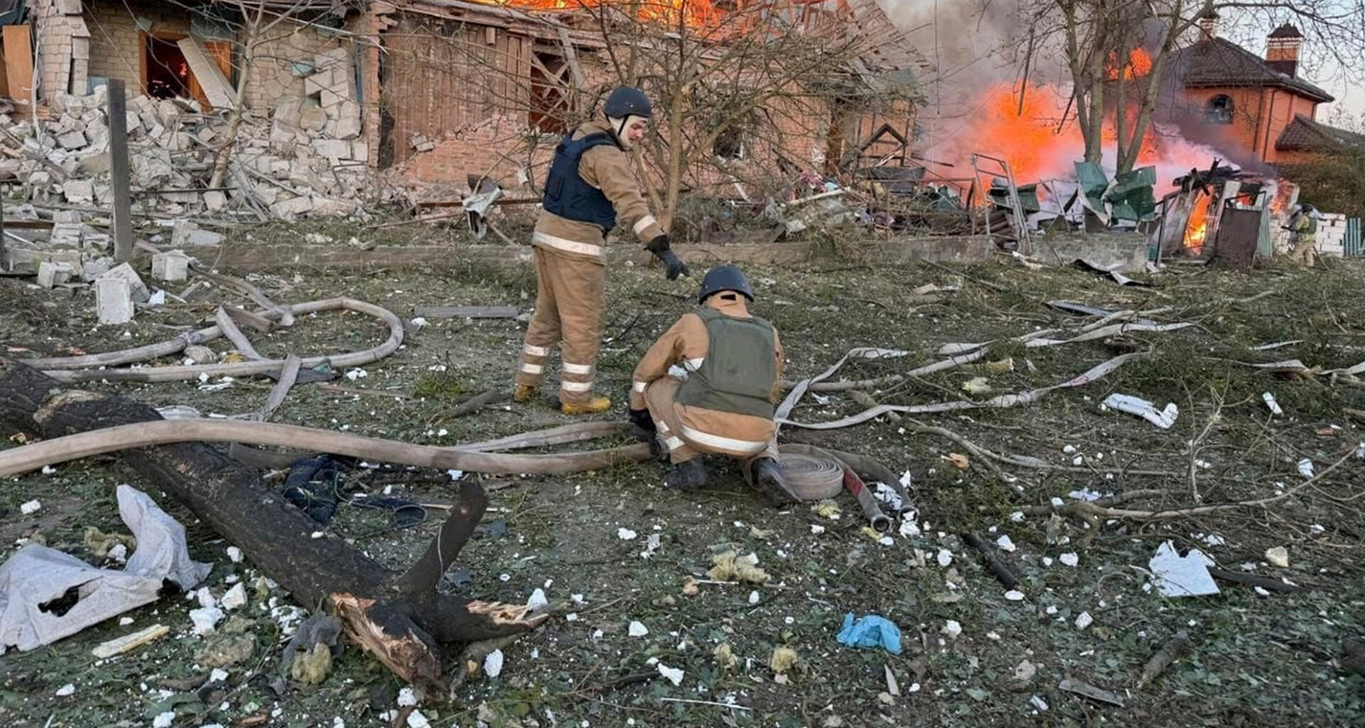 Ukrainian Emergency Services on Wednesday, Sept. 10, 2025, rescue workers put out a fire in a house destroyed by a Russian strike on a residential neighbourhood i