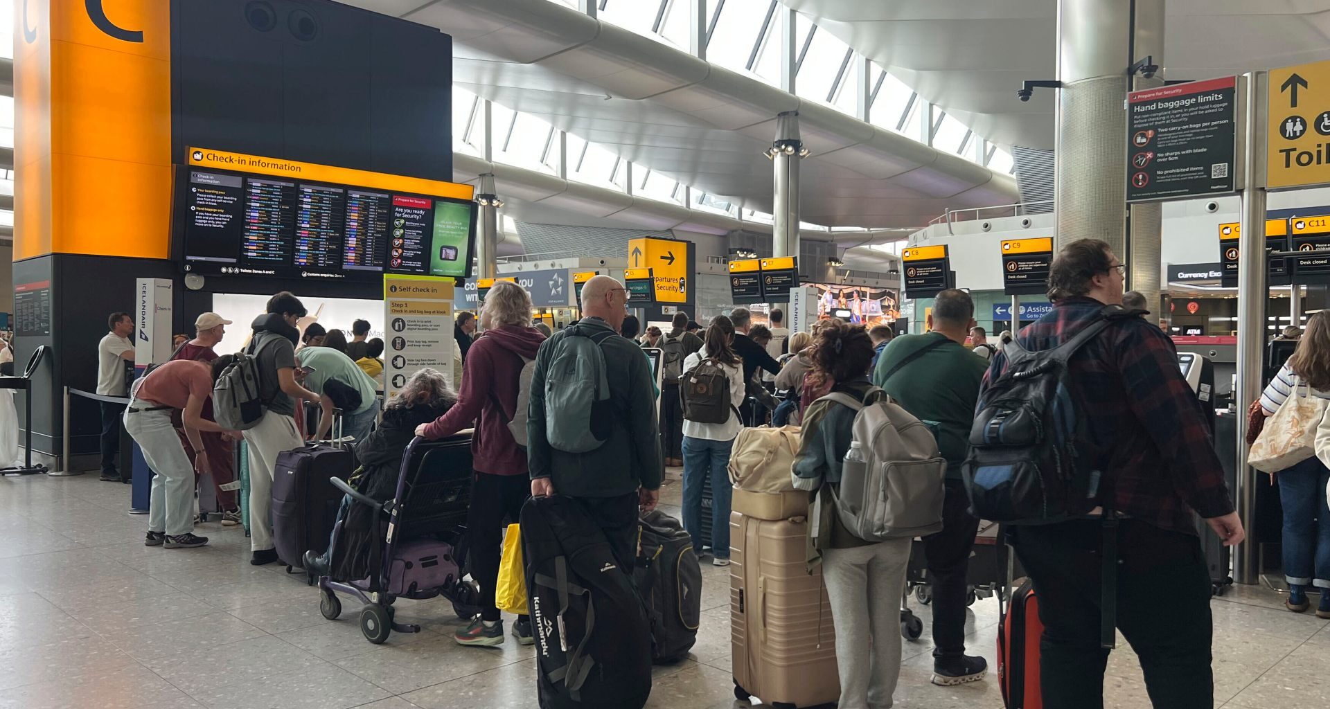 Delays continue to affect thousands as cyberattack hits Europe’s airports | Travel News