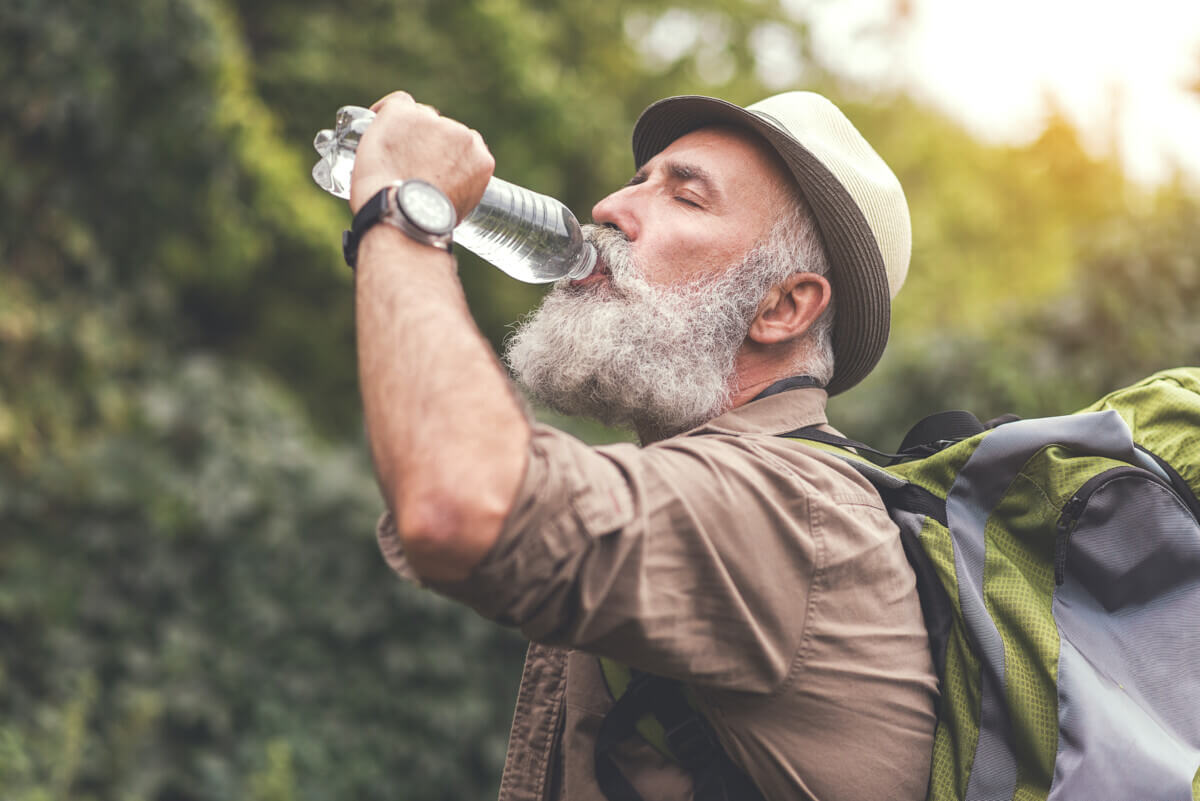 Man drinking bottle of water