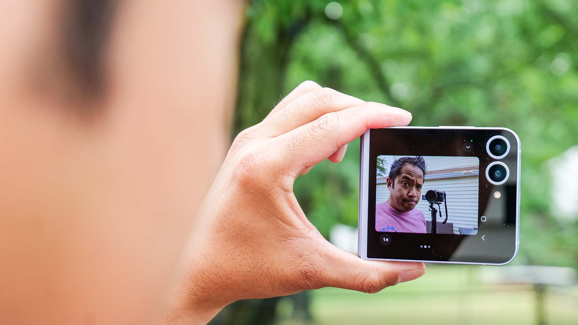 Samsung Galaxy Z Flip 6 taking a selfie.