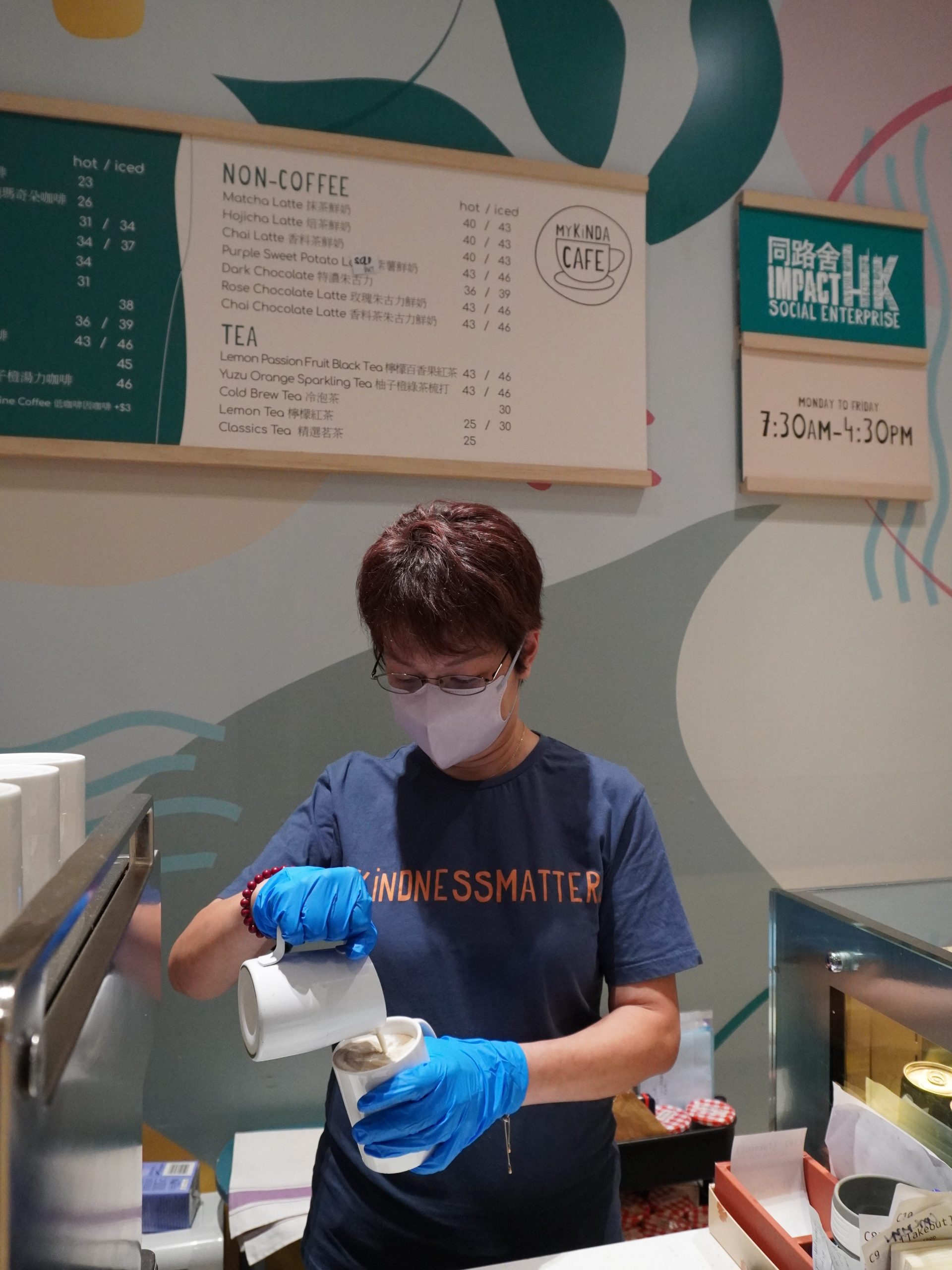 Angel, who took part in ImpactHK's co-living programme, works at the NGO's cafe. Photo: ImpactHK.