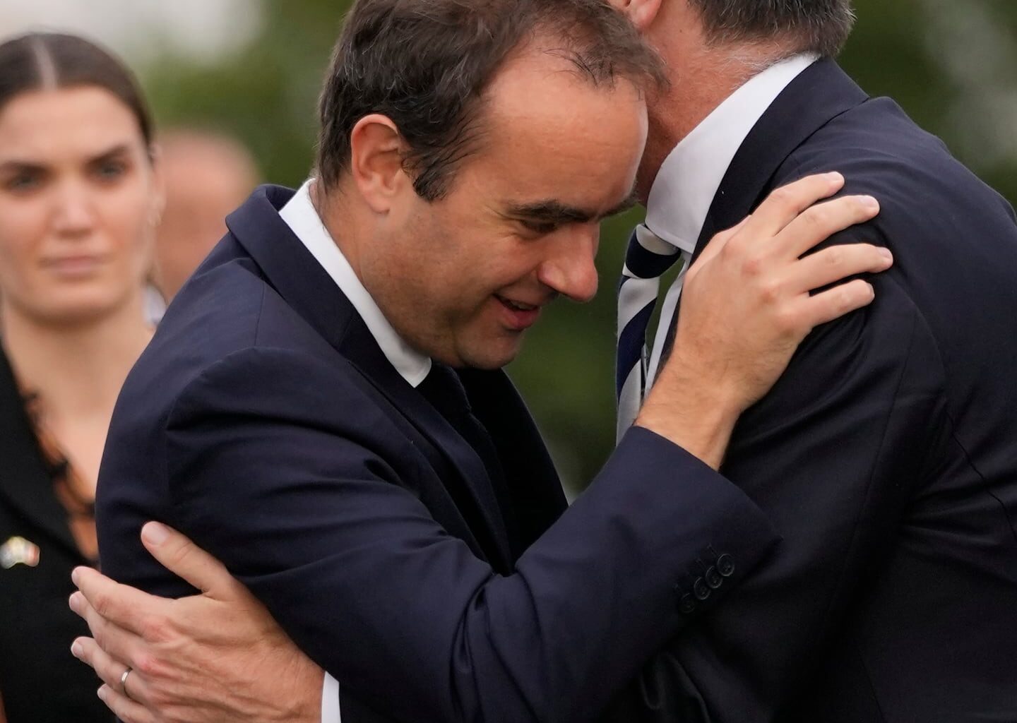 French Defense Minister Sebastien Lecornu, left, welcomes Deputy Prime Minister of Australia and Minister for Defense Richard Marles during a ceremony on Sept. 1, 2022, in Brest, Brittany, France. (AP Photo/Francois Mori, File)