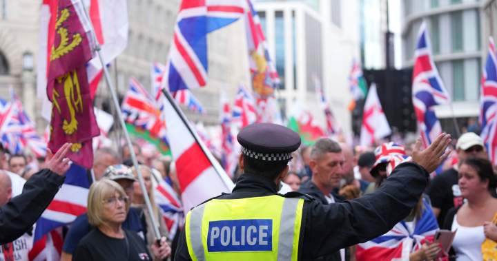 Thousands march in London in support of far-right activist Tommy Robinson - National