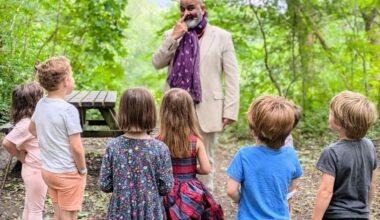 Storyteller Peter Chand in front of a small audience of children