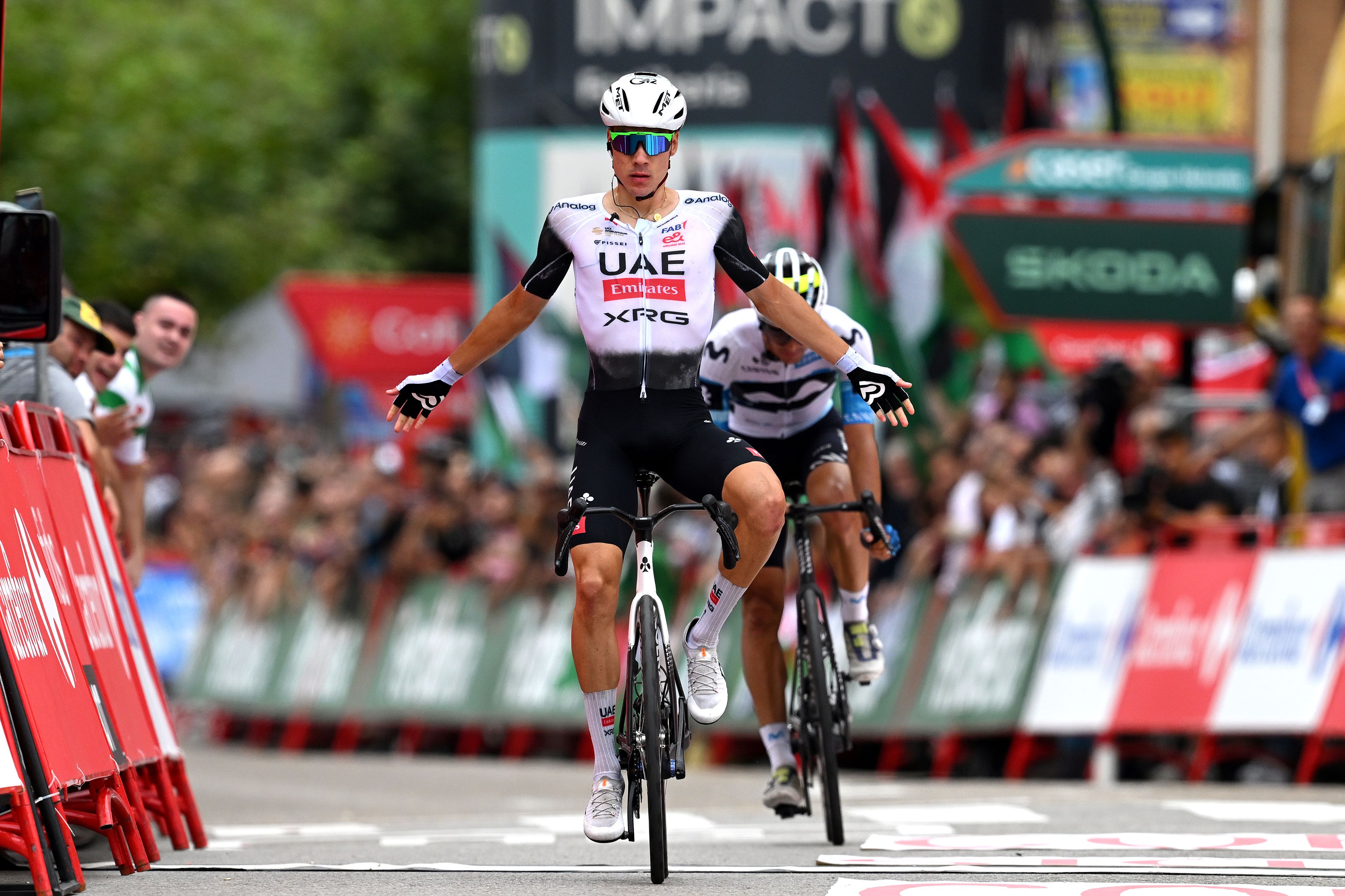 Juan Ayuso wins stage 12 of La Vuelta 2025.
