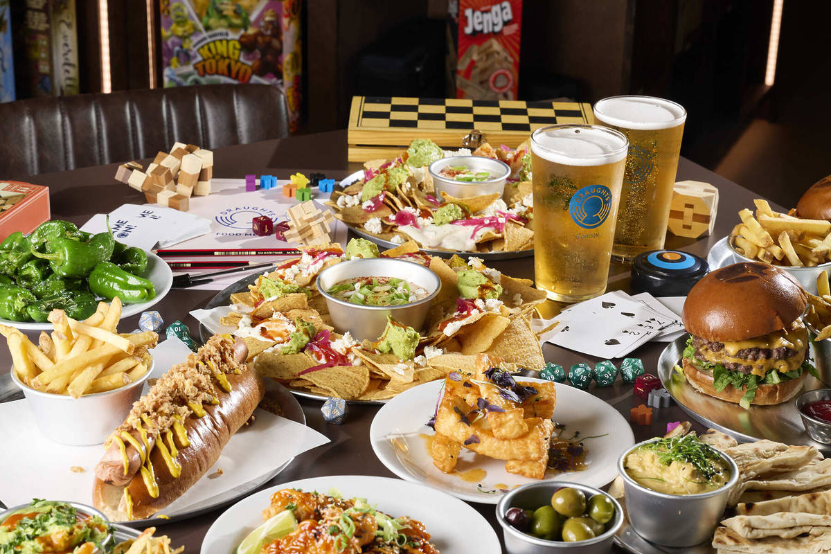 a huge selection of food and drink from the draughts board game cafe, including pints of beer, hot dogs, nachos, and more