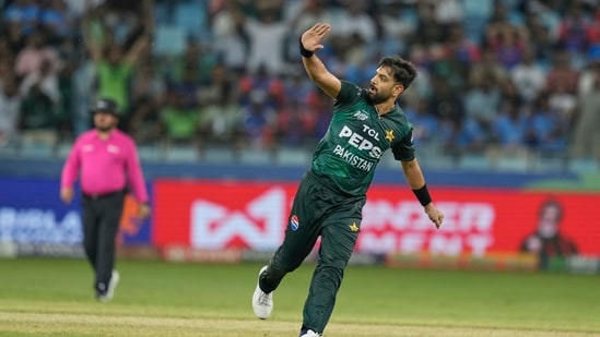 Pakistan's Haris Rauf celebrates the wicket of India's Sanju Samson during the Asia Cup cricket match between India and Pakistan at Dubai International Cricket Stadium(AP)