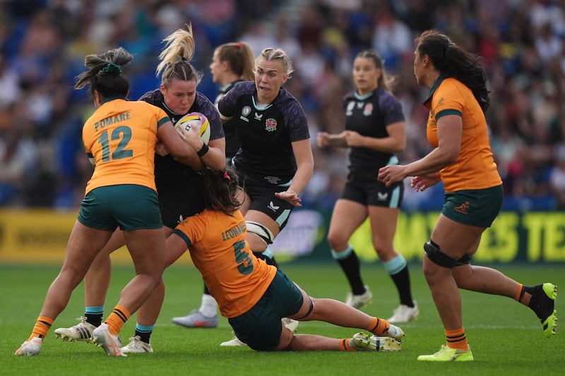 Kelsey Clifford (second from left) crossed twice for the Red Roses