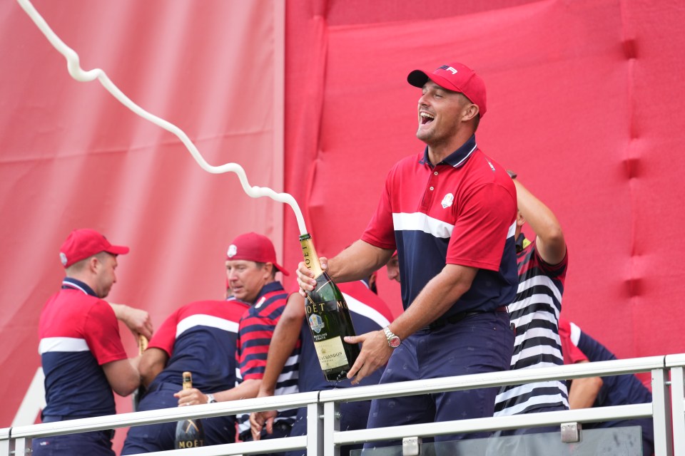 KOHLER, WI - SEPTEMBER 26: Bryson DeChambeau of Team United States squirts champagne after their victory in the 2020 Ryder Cup at Whistling Straits on September 26, 2021 in Kohler, Wisconsin. (Photo by Darren Carroll/PGA of America)