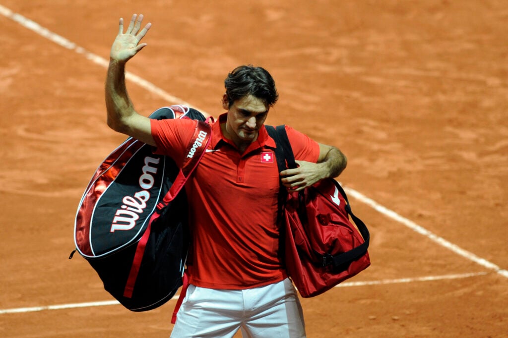 Roger Federer waves to the crowd at the 2012 Davis Cup