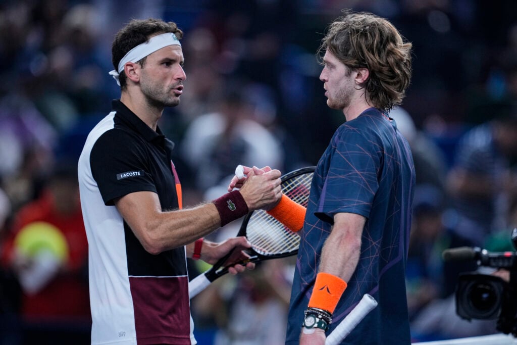 Grigor Dimitrov and Andrey Rublev shake hands after their match at the 2023 Shanghai Masters