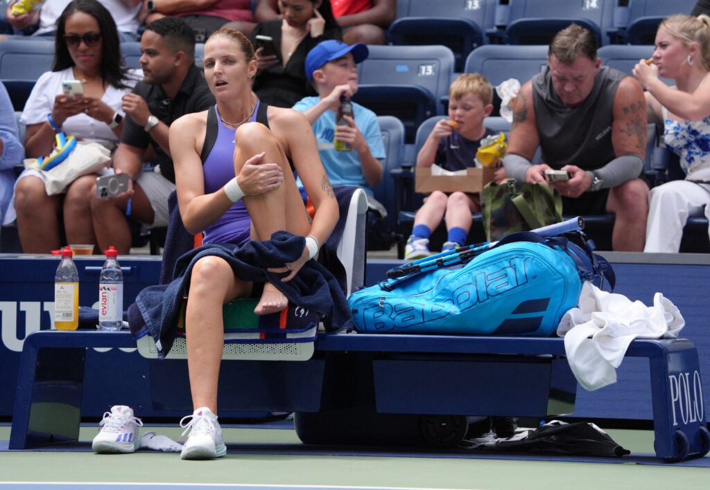 Karolina Pliskova, with an injured foot, retires from her women's singles second round tennis match against Italy's Jasmine Paolini on day four of the US Open tennis tournament at the USTA Billie Jean King National Tennis Center.