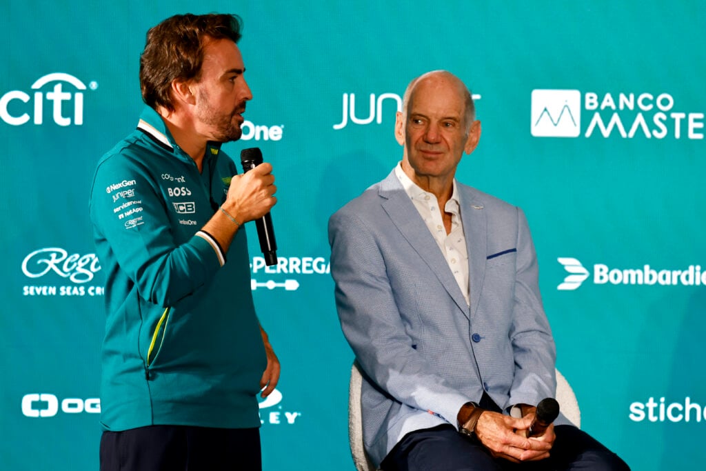 Fernando Alonso speaking alongside Adrian Newey at his Aston Martin unveiling event