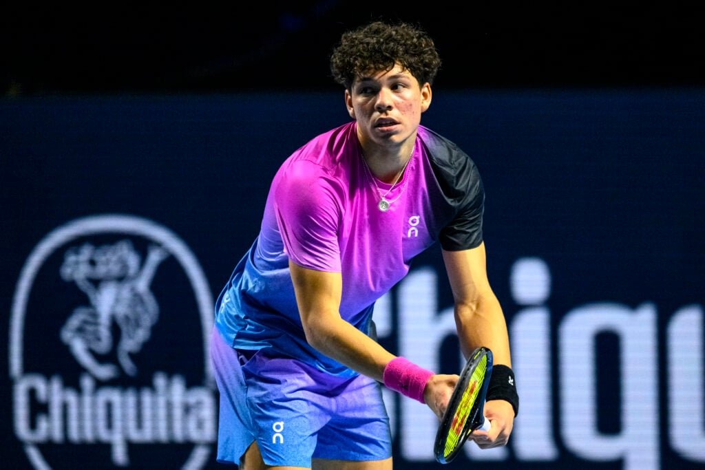 Ben Shelton of the U.S. serves the ball against Stan Wawrinka of Switzerland during the Swiss Indoors Basel.
