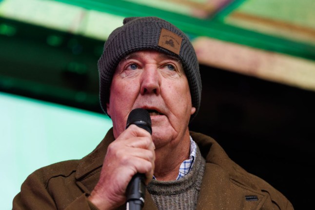 Jeremy Clarkson with microphone wearing hat