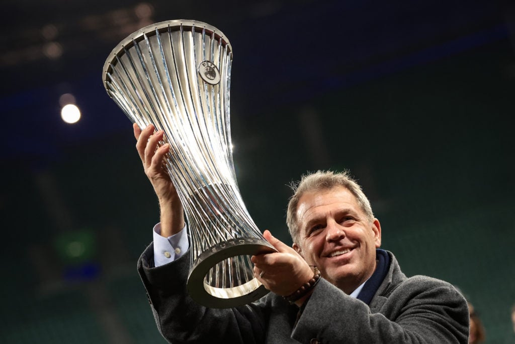 Todd Boehly lifts the Europa Conference League trophy.