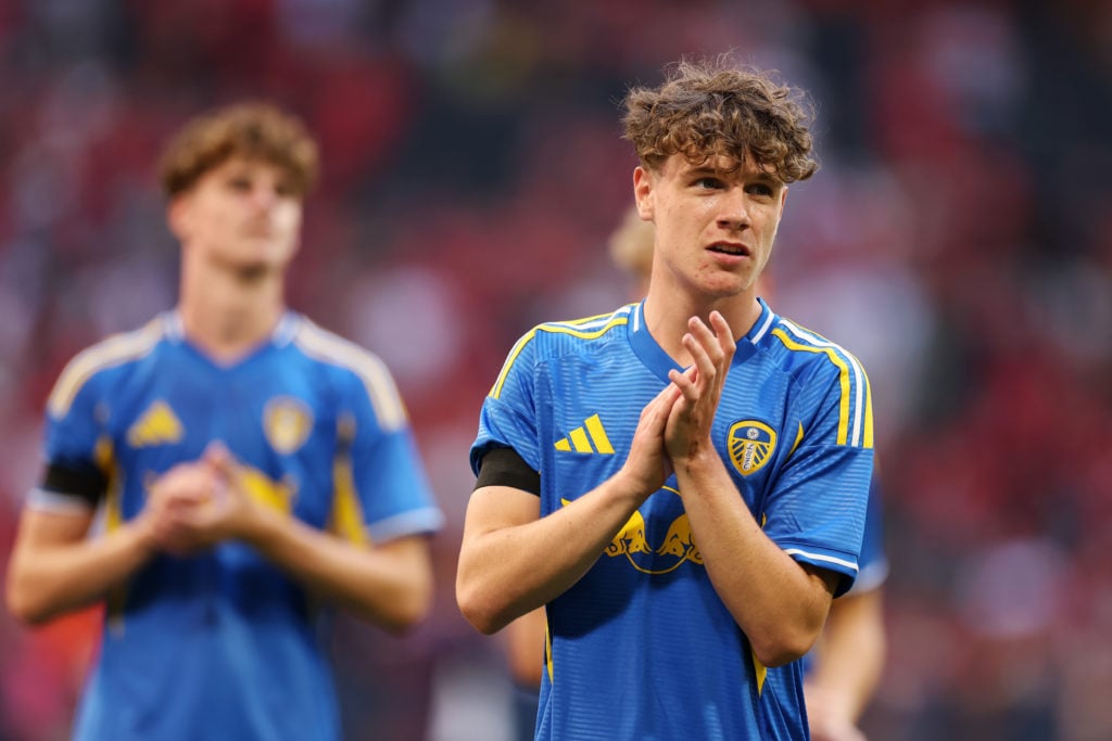 Rhys Chadwick applauds Leeds United fans after a friendly with Man Utd.