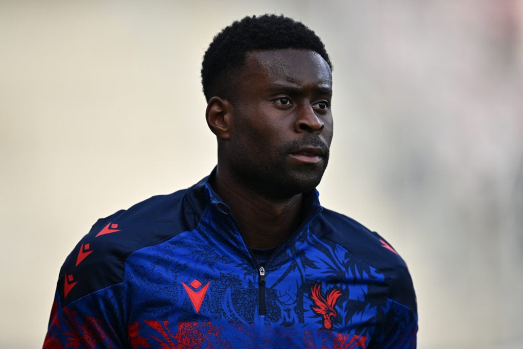 Marc Guehi warms up ahead of Crystal Palace's UEFA Conference League qualifier against Fredrikstad