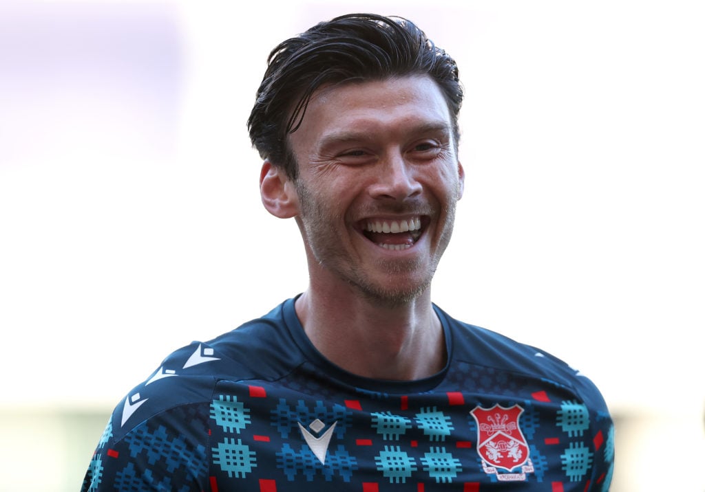 Kieffer Moore of Wrexham looks on