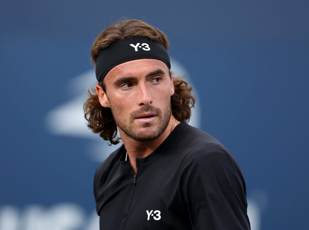 Stefanos Tsitsipas of Greece looks on against Alexandre Muller of France during their Men's Singles First Round match on Day Three of the 2025 US Open at USTA Billie Jean King National Tennis Center.