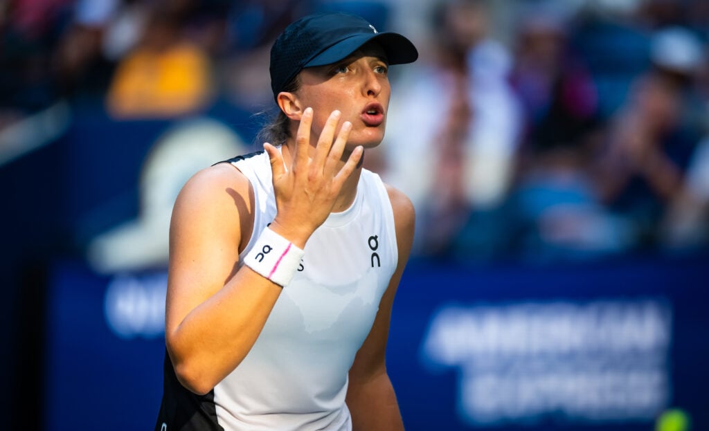 Iga Swiatek of Poland in action against Amanda Anisimova of the United States during the Women's Quarterfinal match on Day 11 of the US Open at USTA Billie Jean King National Tennis Center.