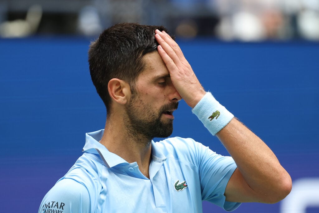 Novak Djokovic of Serbia reacts against Carlos Alcaraz of Spain during their Men's Semifinal match on Day Thirteen of the 2025 US Open at USTA Billie Jean King National Tennis Center.