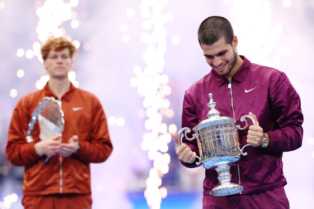 Carlos Alcaraz and Jannik Sinner pose with their trophies after the 2025 US Open final