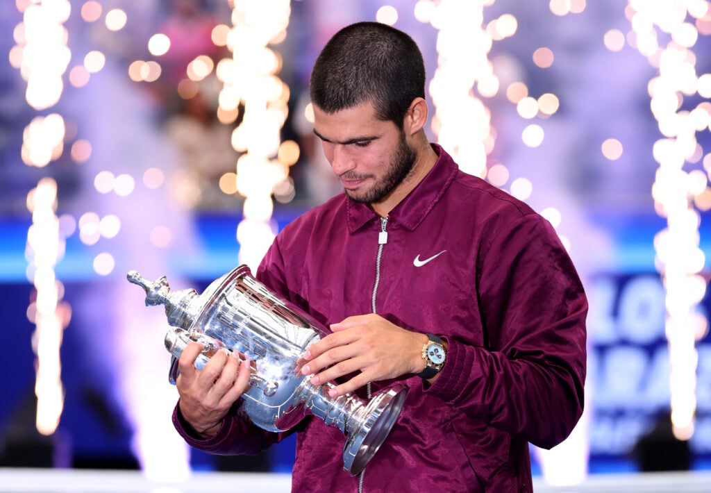 Carlos Alcaraz holds the trophy after winning the 2025 US Open