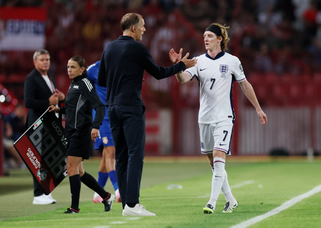 Anthony Gordon shakes Thomas Tuchel's hand during England's World Cup qualifier against Serbia.