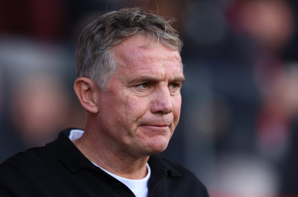 Phil Parkinson, Manager of Wrexham looks on