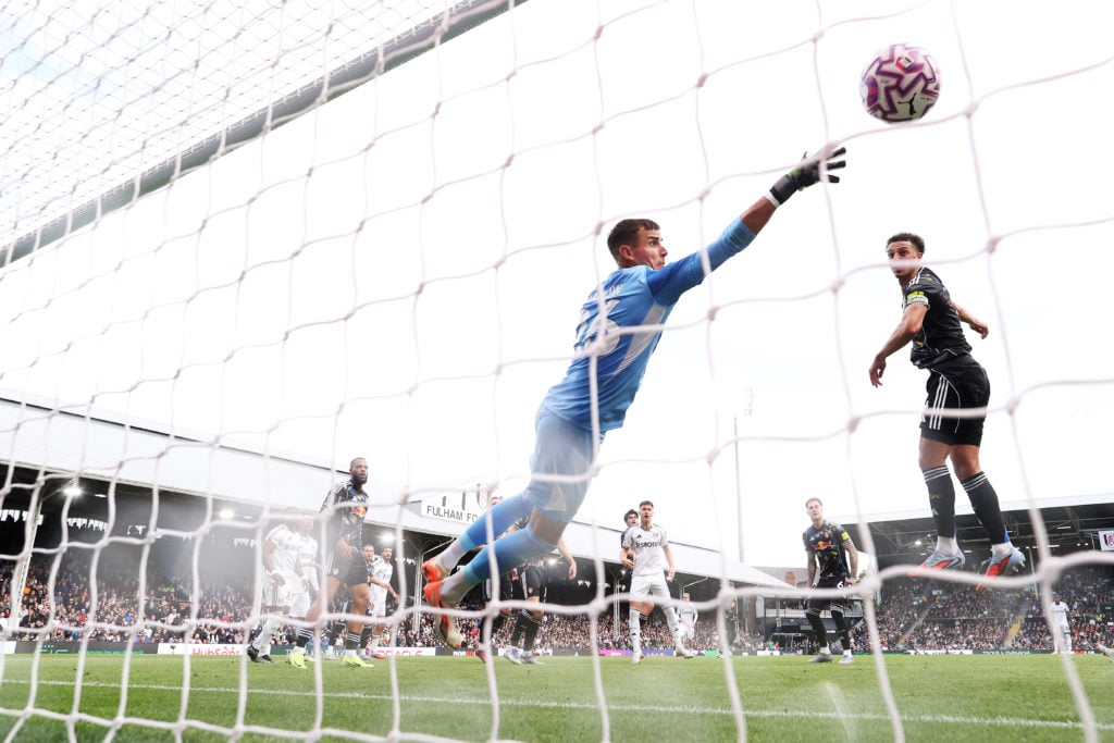 Karl Darlow tries to stop Gabriel Gudmundsson's header going into Leeds United's goal vs Fulham.