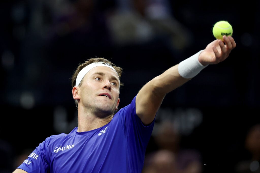 Casper Ruud serves against Reilly Opelka at the 2025 Laver Cup