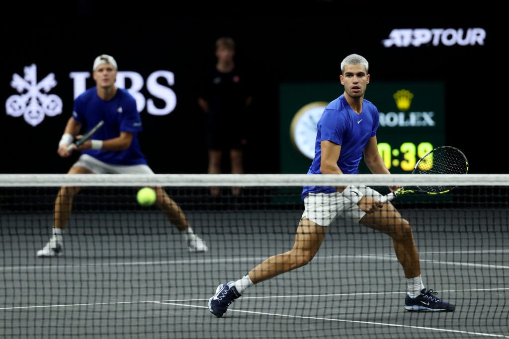 Jakub Mensik of Team Europe and Carlos Alcaraz of Team Europe look on against Taylor Fritz of Team World and Alex Michelsen of Team World during day one of Laver Cup 2025 at Chase Center.