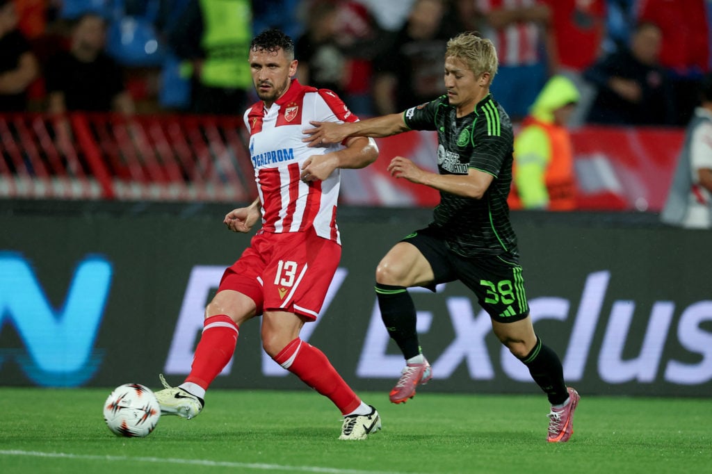 Daizen Maeda challenges for the ball during Celtic's Europa League clash against Red Star Belgrade.