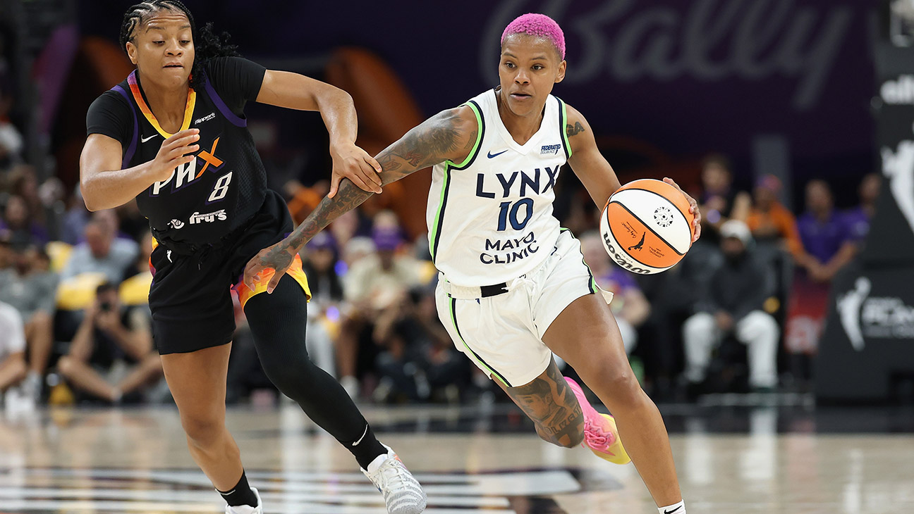 Courtney Williams 10 of the Minnesota Lynx drives the ball past Monique Akoa Makani 8 of the Phoenix Mercury during the first half of Game Four of the 2025 WNBA Playoffs semifinals at PHX Arena on September 28, 2025 in Phoenix, Arizona.