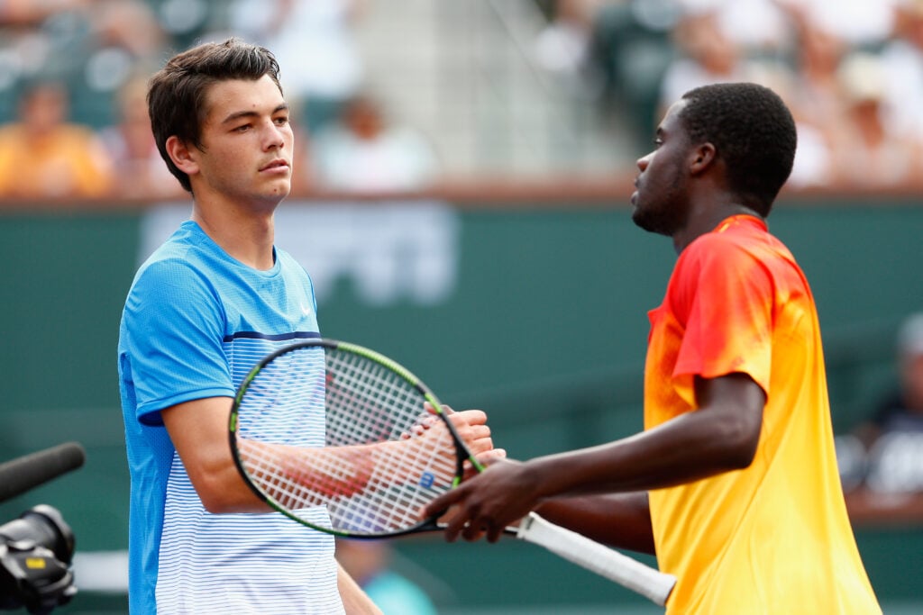 Taylor Fritz and Frances Tiafoe shake hands after their match at Indian Wells in 2016