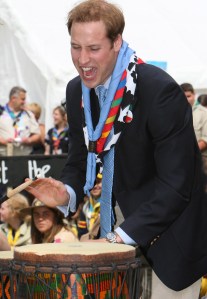 CHELMSFORD- JULY 28: (NO PUBLICATION IN UK MEDIA FOR 28 DAYS)  Prince William enjoys banging the drums as he attends the opening of the 21st World Scout Jamboree at Hylands Park on July 28, 2007 in Chelmsford, England.   (Photo by Pool/Anwar Hussein Collection/WireImage)