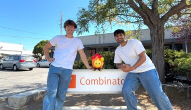 Candle founders at the Y Combinator sign