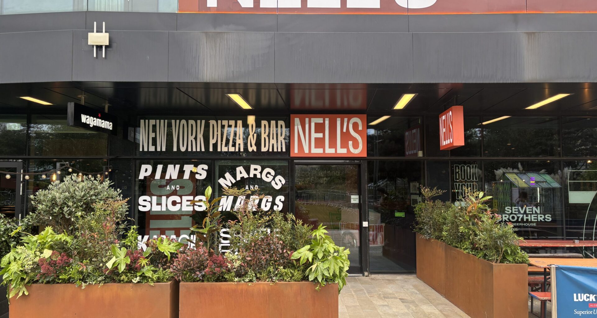 Nell's pizza opens Media City branch offering karaoke and a disco theme