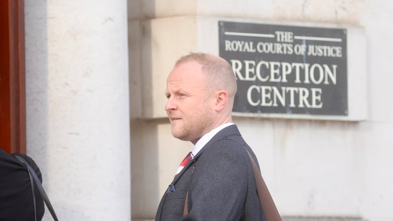 Jamie Bryson says Liz Kimmins must ‘accept her illegality’ over Irish language signs at Grand Central Station or court challenge will proceed